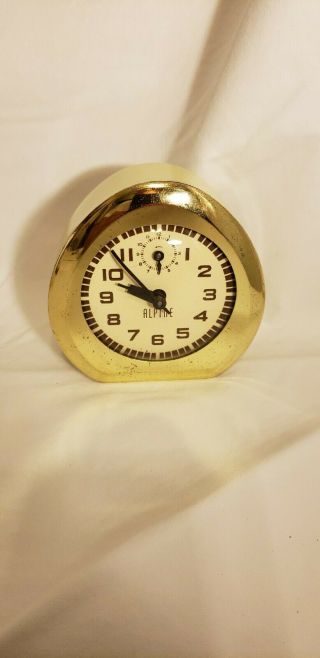 Vintage 1950s,  1960s,  Ingraham Alpine Wind Up Alarm Clock.  And.