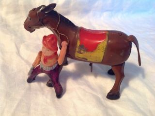 Vintage Occupied Japan Tin Wind Up Mechanical Horse W/Celluloid Plastic Rider 6