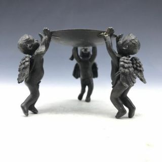 The Bronze Candlestick In Ancient China Was Hand - Made By Three Children