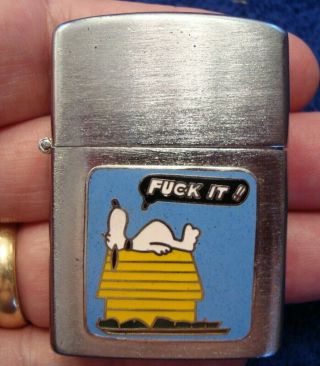 Vietnam Era Cigarette Lighter Snoopy Laying On His Dog House Yelling " F Ck It "