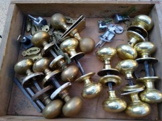Set Of 9 Brass / Brass Plated Door Knobs.  Various Wear.
