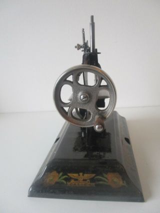 Antique toy sewing machine Casige Made in Britisch zone Germany unusual decal 4