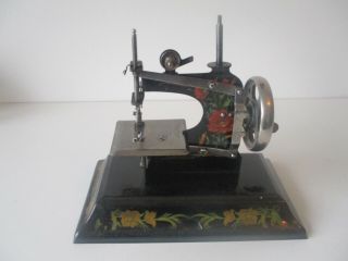 Antique toy sewing machine Casige Made in Britisch zone Germany unusual decal 7