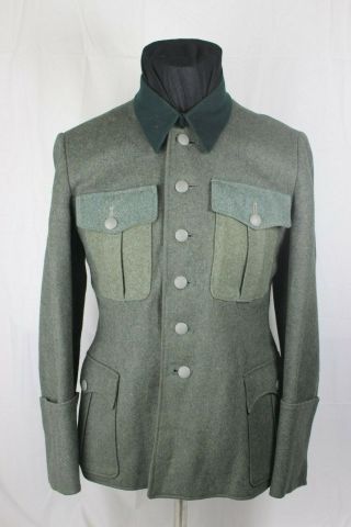 World War 2 M36 Tunic Reissued With Elite Insignia Shadows