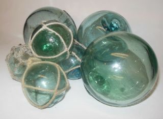 7 Vintage Glass Ball Fishing Floats 3 @ 4 " - 4 @ 2 1/2 " Pale Green/aqua