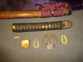 Japanese WWll sword in civilian mountings,  bohi engravings 10