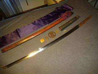 Japanese WWll sword in civilian mountings,  bohi engravings 2
