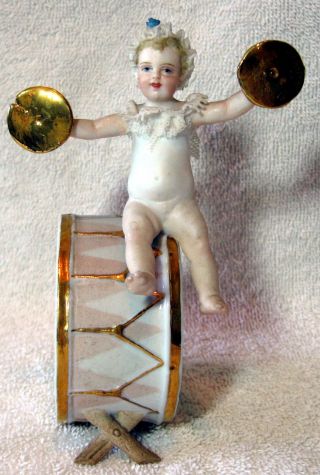 A Antique German Bisque Porcelain Lace Child Seated On Drum Figurine