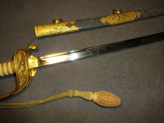K66 Japanese WWll Naval sword,  parade saber in mountings,  ray skin,  knot 8