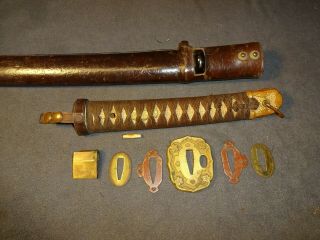 Japanese WWll Army officer ' s sword in combat mountings,  Gendaito 