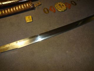 Japanese WWll Army officer ' s sword in combat mountings,  Gendaito 
