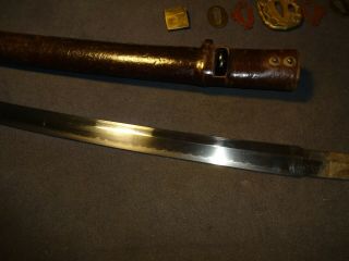 Japanese WWll Army officer ' s sword in combat mountings,  Gendaito 