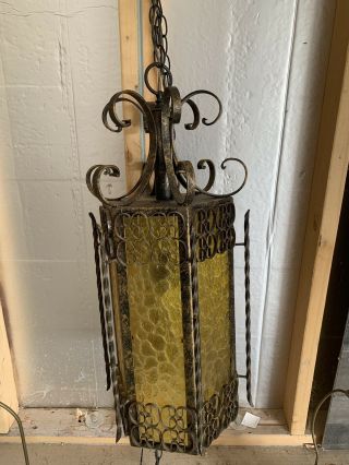 Mid Century Spanish Revival Hanging Swag Lamp Wrought Iron Yellow Glass