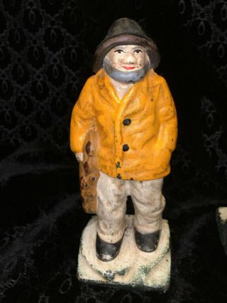 PAIR YELLOW 1920s CAST IRON GLOUCESTER FISHERMAN OLD SALT DOORSTOP By HUBLEY 6