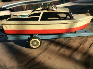 Tin Wind Up Toy Speed Boat 1950s W/ Trailer And Outboard
