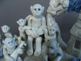 An unusual Chinese porcelain Monkey Troupe,  in human positions.  Late 19th C/ Re 2