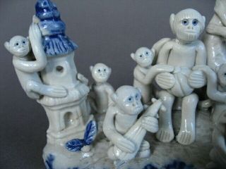 An unusual Chinese porcelain Monkey Troupe,  in human positions.  Late 19th C/ Re 3