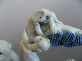 An unusual Chinese porcelain Monkey Troupe,  in human positions.  Late 19th C/ Re 8