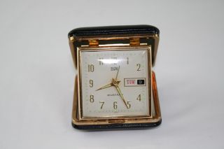 Vintage Elgin Day & Date Travel Alarm Clock,  Black Case,  Glow In Dark.