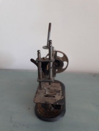 Very small antique CASIGE Germany miniature toy metal child ' s sewing machine 8