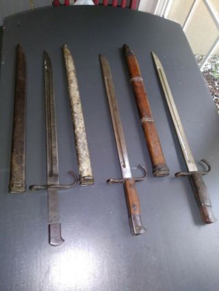WW2 Japanese Type 30 Bayonets.  Two.  from Tokyo Arsenal and 3rd not Marked.  Bayone 2