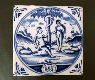 A Delftware Adam And Eve Tile,  Circa 1700 - 1720