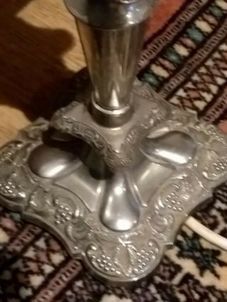 A GOOD QUALITY ANTIQUE SILVER PLATE EMBOSSED TABLE LAMP 6