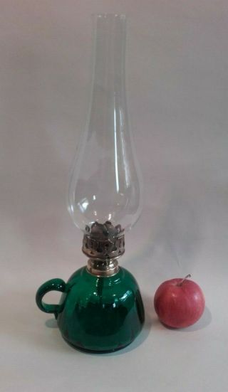 Antique Falks Small Hand Oil Lamp With Dark Green Glass Base.