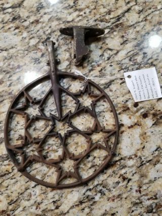 ANTIQUE CAST IRON HEARTH TRIVET WITH BRACKET FOR COOKING VESSEL.  EARLY/GRISWOLD? 4