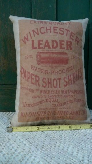 Primitive Vintage Advertising Pillow Winchester Shot Gun Shells Cowboy Old West