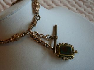Antique Gold Plated Watch Chain With Horse Heads And Fob.