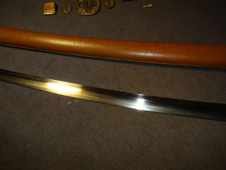 Japanese WWll Army pilot,  tank crew`s sword in combat mountings 