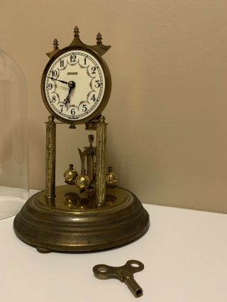 Rensie Dome Clock.  Rotating pendulum. 4