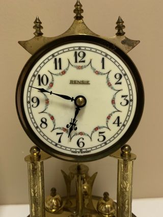 Rensie Dome Clock.  Rotating pendulum. 5
