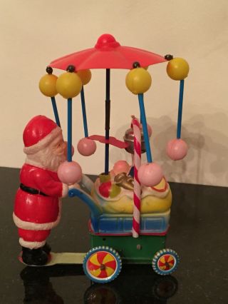 Vintage Toy Santa Claus Celluloid Tin Litho Wind Up Spinning Umbrella Baby Buggy 4