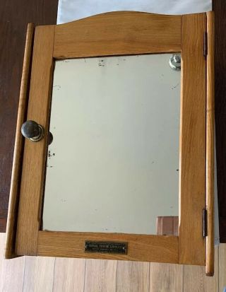 Antique C.  1910 Medicine Cabinet With Mirror By The The Initial Towel Supply Co