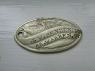 CIVIL WAR ERA DOG TAG J.  W.  PENDEXTER 55 WARREN ST.  CHARLESTOWN MASS.  SOLDIER 4