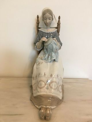 Lladro Figurine Of A Woman Doing Crewel
