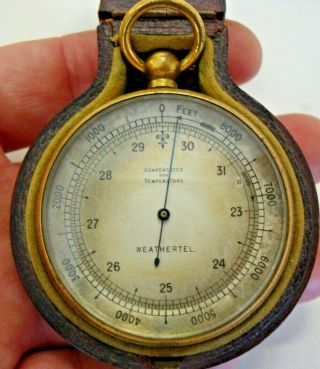 Circa 1900 Cased Pocket Barometer Marked Weathertel In Gilt Brass Cased