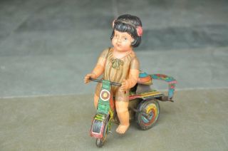 Vintage Wind Up Girl On Tricycle Litho Tin & Celluloid Toy,  Japan