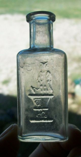 Vintage 3 3/8” Tall 1 Wing Owl Drug Co.  Embossed Clear Medicine Bottle
