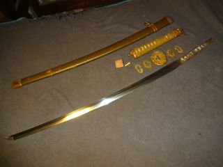 Japanese WWll Army officer ' s sword in mounting,  