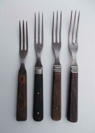 4 Antique Primitive Black & Brown Wooden Handle 3 Tine Forks
