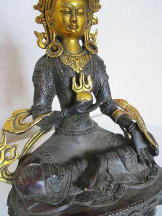 Chinese Oriental Tibetan Gilt Bronze Figure of Deity Holding Pearl 3