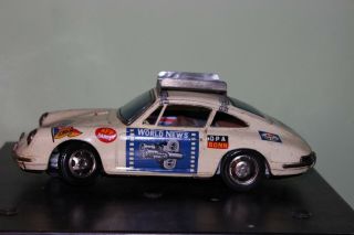 Vintage 1960s Tps Japan Battery Operated Porsche World News Tin Car
