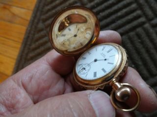 A.  W.  C0.  Antique 14K solid gold pocket watch with 3 factory Diamonds 11