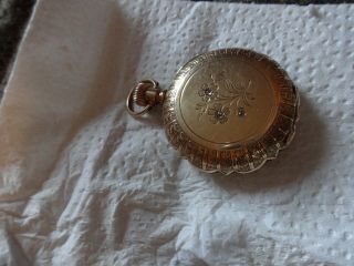 A.  W.  C0.  Antique 14K solid gold pocket watch with 3 factory Diamonds 12