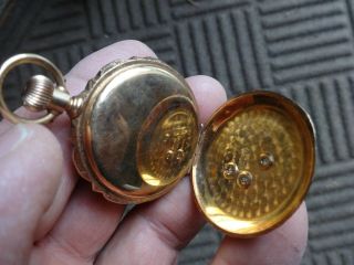 A.  W.  C0.  Antique 14K solid gold pocket watch with 3 factory Diamonds 8