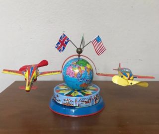 Vintage German Tin Litho Wind Up Globe World Toy Airplane Model Circus Park Flag