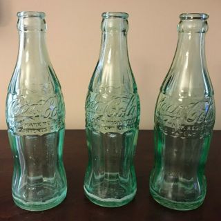 3 Coca - Cola Bottles,  " Trademark Registered In Us Patent Office " - 6 Fl.  Ozs.
